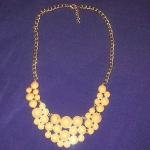 Necklace with purplelish stones